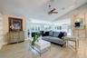 Living room with wood burning fireplace