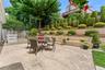 The great outdoors featuring an expansive patio and beautifully landscaped garden.