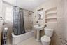 Primary bedroom en-suite bathroom.