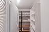 Butler's pantry with an extra fridge and storage galore!