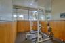 The sauna sits off to the right in this room.