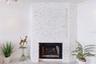 The natural stone facade flows throughout the home tying each space together in perfect harmony.