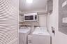 A full-size laundry with room to move around.