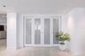 The sitting room/ bonus room/office or 4th bedroom are right through these doors.