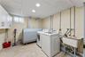Main level storage, utilities and laundry.