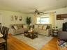 You instantly feel right at home in this adjoining Living room, conveniently located where family and friends gather.