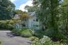 Approach to the home with recent driveway.