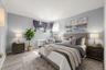 Virtually staged, Primary bedroom, main level.