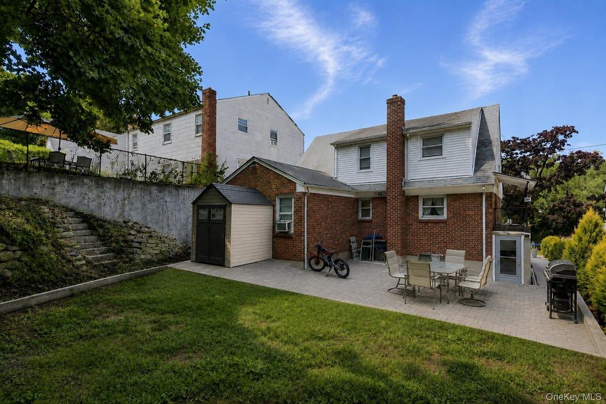 View of garden , patio & rear of house