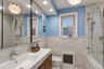 Marble bathroom w glass shower door