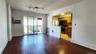 2nd floor- combo living/dining room and kitchen with balcony