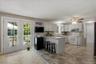 Spacious & Bright Kitchen with Breakfast nook and French doors to trex deck