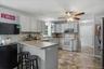 Spacious & Bright Kitchen with Breakfast nook and French doors to trex deck