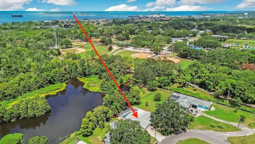 Welcome to 1788 Patricia Ave Dunedin and your lakefront sanctuary with the beach being this far away