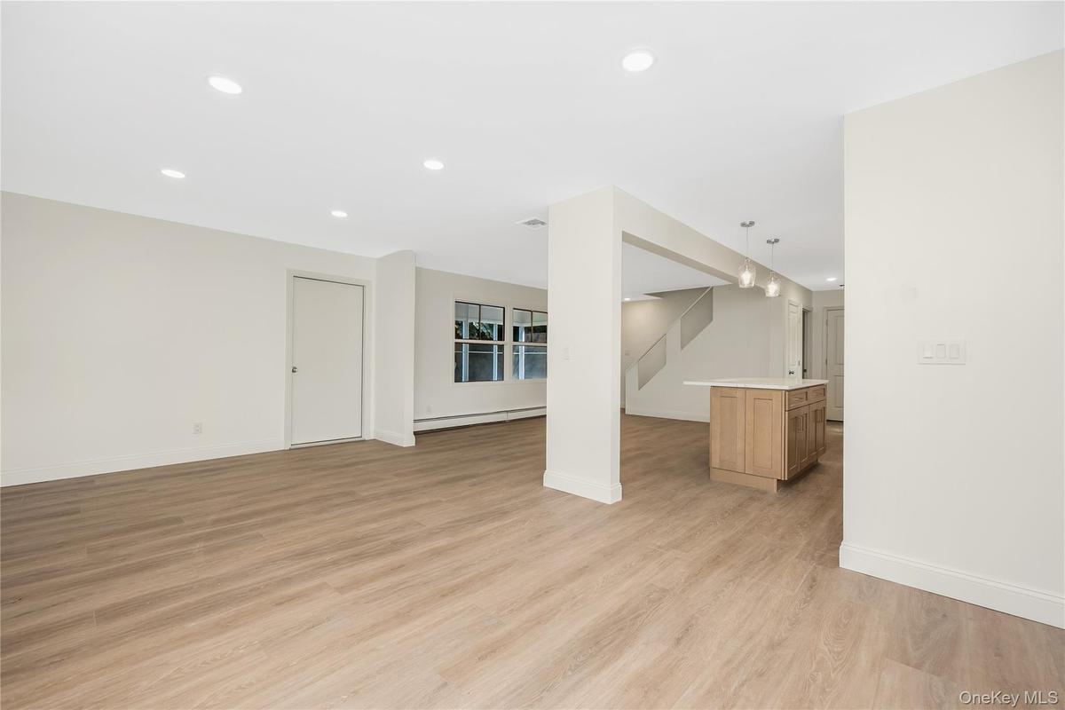 Open floor plan area LR/DR view into kitchen