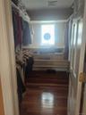 Master Bedroom large walk-in closet with window