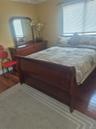 2nd Floor bedroom with wood-finish flooring, window, closet and ceiling fan