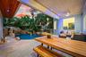 Covered outdoor living area featuring a wood-finish ceiling with recessed lighting and a ceiling fan