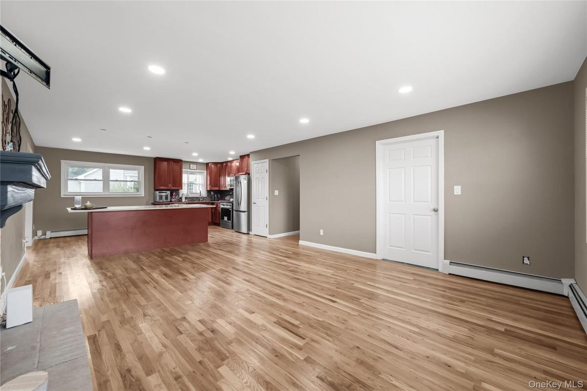 Another View of the Open Concept Living Room and Kitchen Area