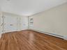 Double closets provide abundant storage without sacrificing the impressive size and versatility of the room.