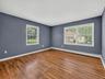 Bright and generously proportioned, this spacious bedroom features beautiful hardwood floors and natural light from two exposures.