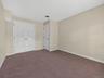 The finished lower level includes a spacious additional bedroom