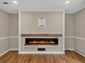 A custom remote-controlled water vapor fireplace creates an incomparable atmosphere with the look of dancing flames in every season. Enjoy year-round 