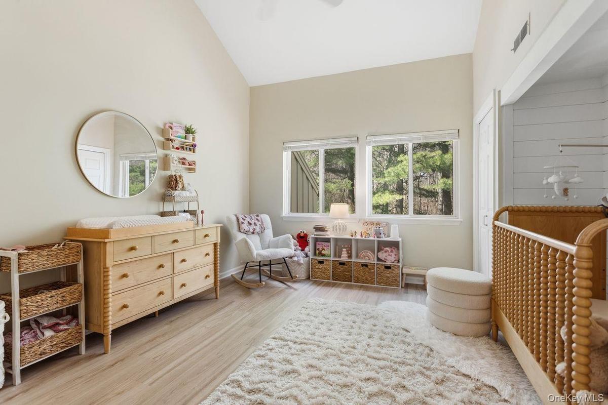 Bright and airy secondary bedroom.