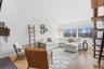 Living room with cathedral ceilings.