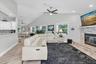 The spacious living &  dining areas flow seamlessly into the family room, creating an inviting and open setting for everyday living and entertaining.