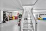 Take the steps down to an enormous garage offering an exceptional amount of space for vehicles, storage, hobbies and so much more.