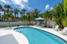 Surrounded by lush tropical landscaping, the pool area creates a private, resort like setting; your own peaceful Florida retreat right at home.