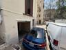 The door at the far end is deeded additional storage unit for easy access if you have items not appropriate for the warehouse level loading dock.