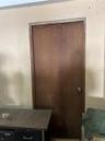 Door from garage to lobby staircase.