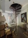 Spiral staircase on the lower warehouse level.