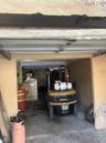 Garage has enough depth for a forklift at the rear and another vehicle.