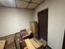 Separate entrance to the building's lobby and stairs to lower level and parking garage.
