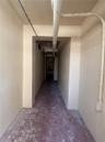 There is an entrance from the parking area to the building lobby. There is also direct access from the garage, warehouse and retail levels to the lobb