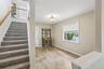 Second floor has 2 bedrooms, living room and full bathroom