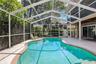 Heated pool and auto sweeper, two story screen
