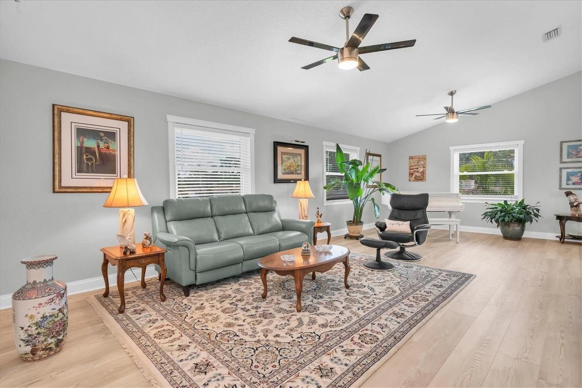 Another view of the expansive living room, highlighting the generous proportions, high ceilings and wonderful flow of the home.