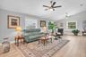 Another view of the expansive living room, highlighting the generous proportions, high ceilings and wonderful flow of the home.