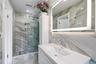 Full bathroom off entry hall