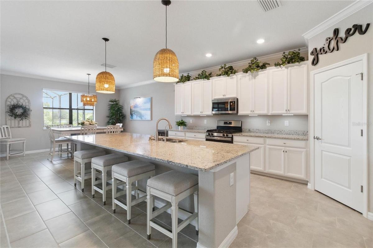 Huge Island and Open Well-Stocked Kitchen