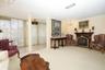 Living room & flex space with tiled floors.