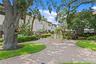 Brick pavers add charm and continuity throughout the community, lining the central courtyard as well as each driveway and front walkway.