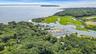 Expansive Peconic Bay, marina with multiple boat slips