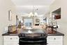 Kitchen with island and pendant lighting
