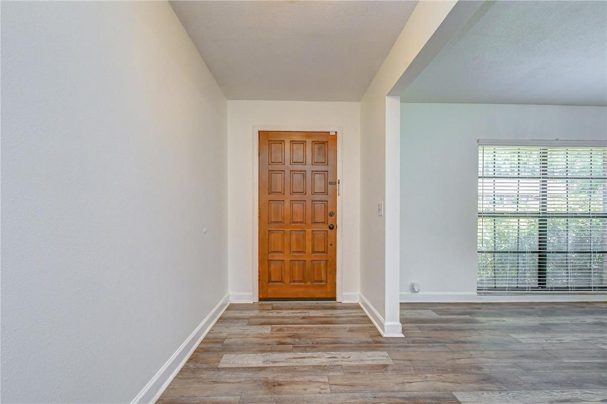 Bright entryway introducing the home's spacious and inviting layout