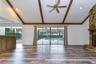 Grand sliders create a seamless connection between the family room and screened lanai
